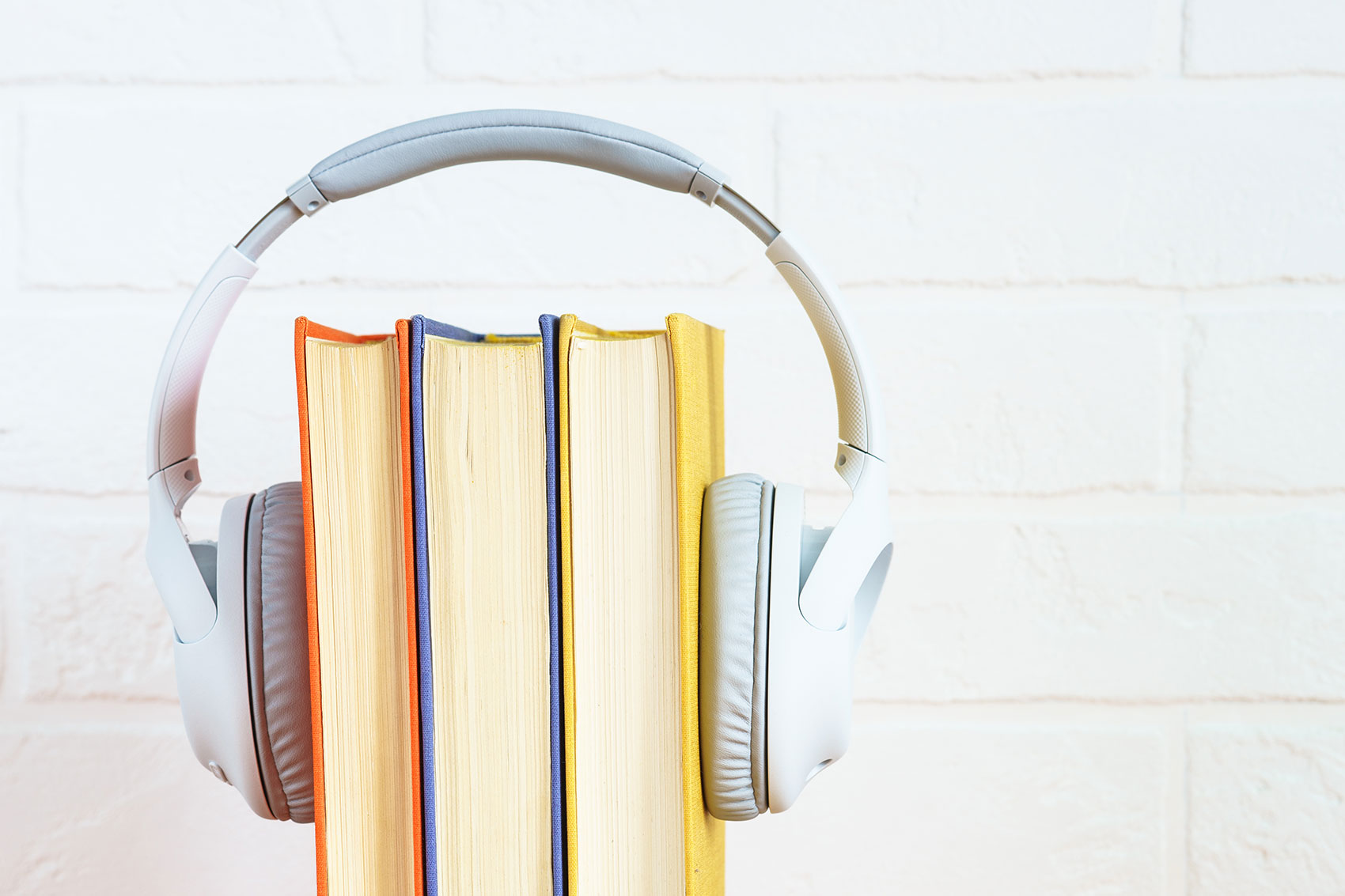 Headphones on Top of Books