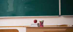 Classroom Table with an Apple on Top